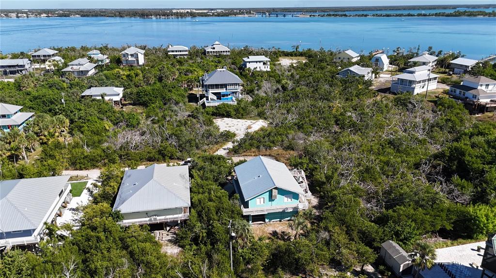 9568 Buccaneer Trail Boca Grande, FL 33921 - Photo 7 of 49 an aerial view of a house with outdoor space