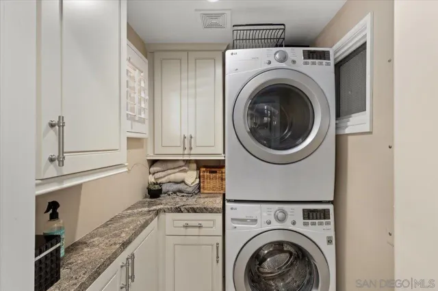 a living room with furniture fireplace and flat screen tv