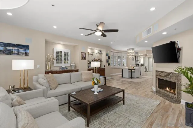 a bedroom with a large bed and a couch