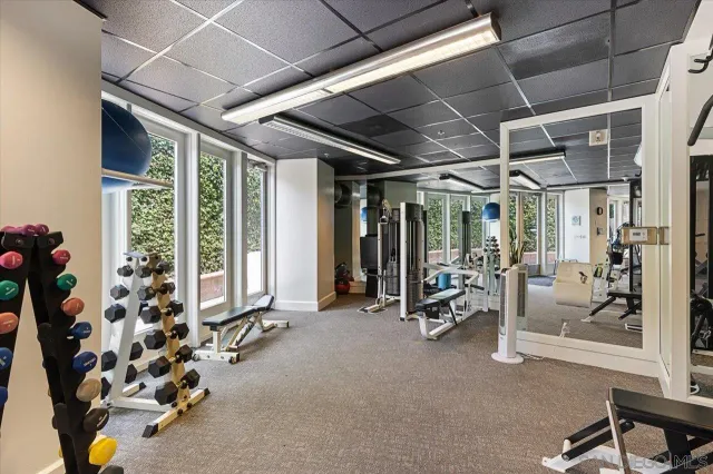 a bathroom with a shower and a sink