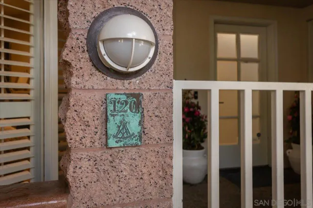 a view of a entryway with flower pots