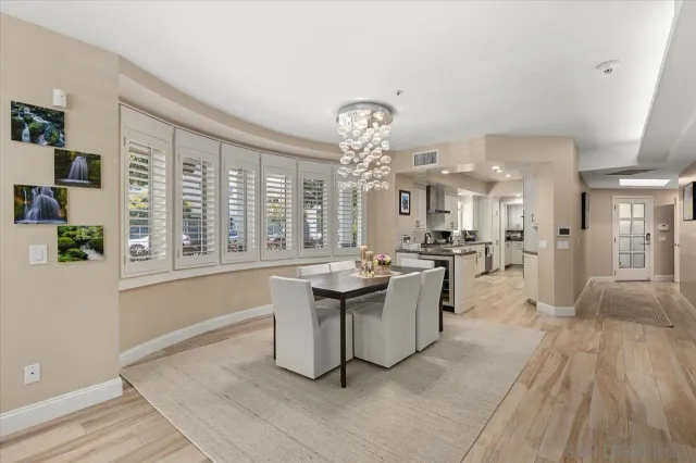 a kitchen with sink and cabinets