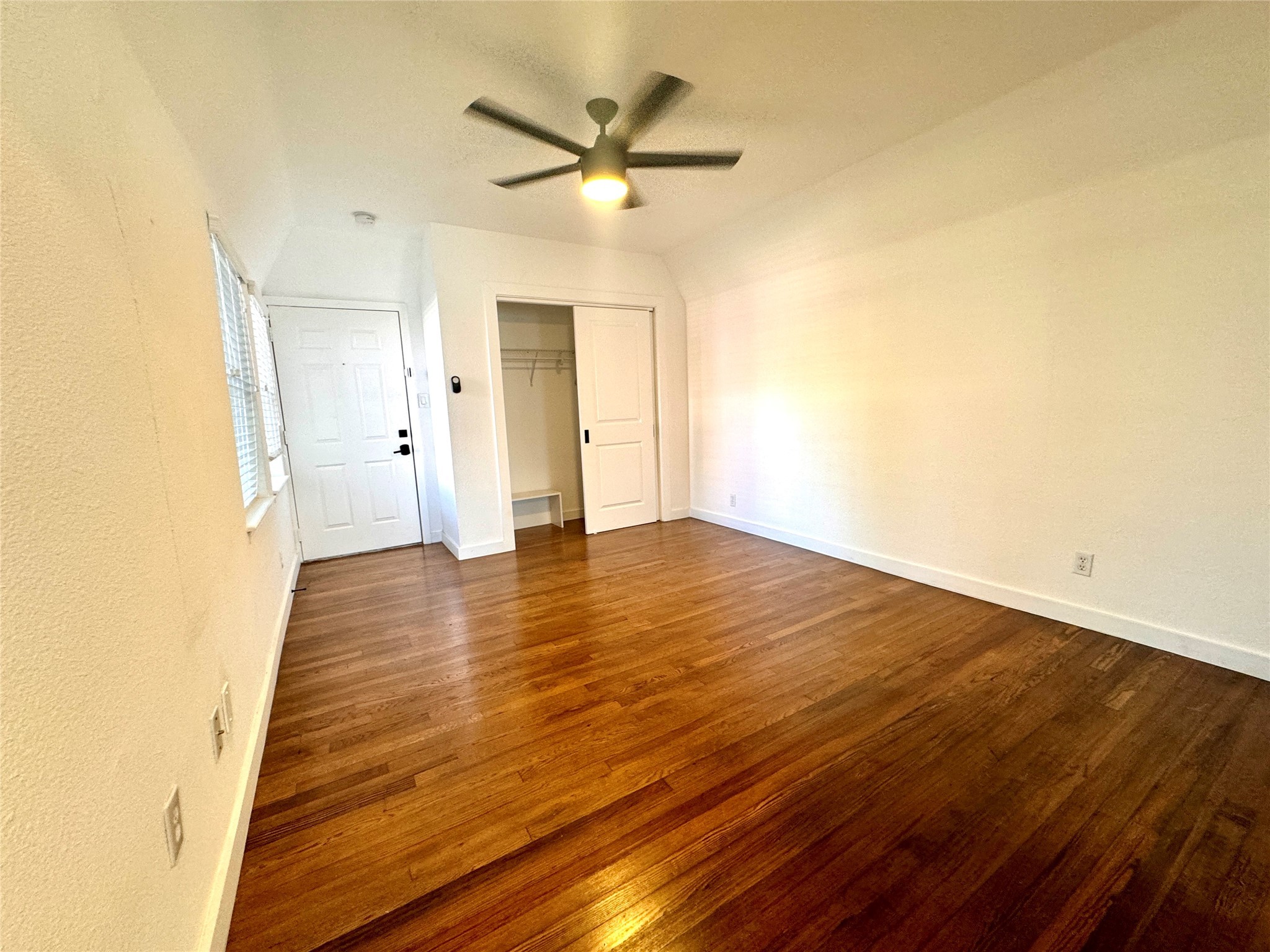 415 Fairview Street, Unit 4 Houston, TX 77006 - Photo 9 of 10 Studio apartment has great natural light, refinished hardwood floors and closet for storage.