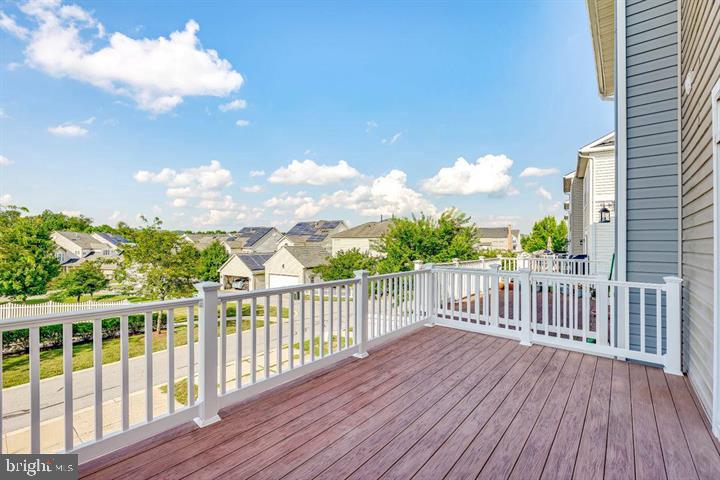 11843 Skylark Road Clarksburg, MD 20871 - Photo 13 of 31 a view of a balcony with wooden floor
