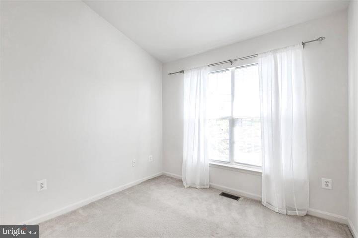 11843 Skylark Road Clarksburg, MD 20871 - Photo 19 of 31 a view of an empty room with a window