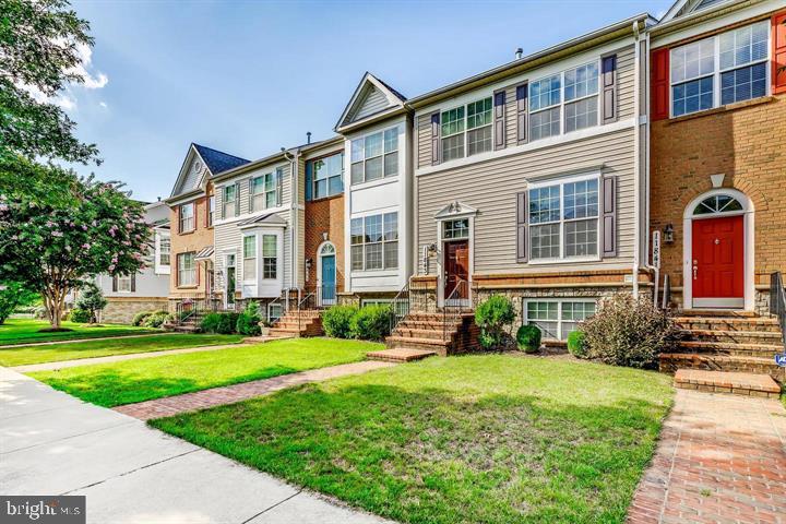 11843 Skylark Road Clarksburg, MD 20871 - Photo 2 of 31 a front view of a house with a yard