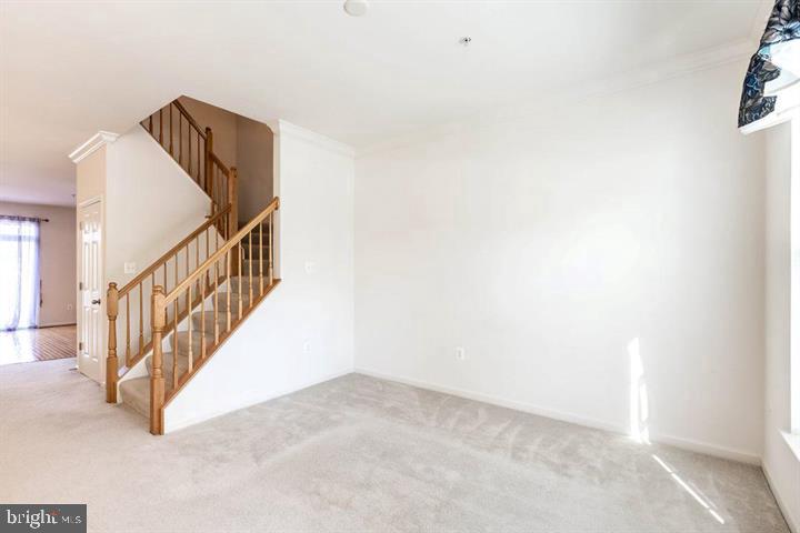 11843 Skylark Road Clarksburg, MD 20871 - Photo 4 of 31 a view of a hallway with staircase