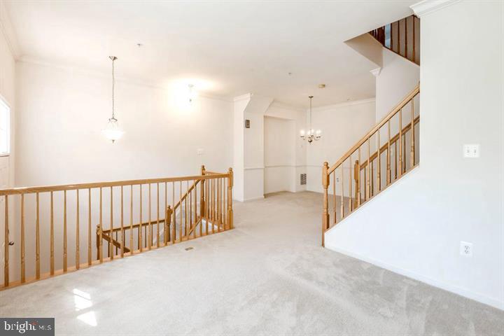 11843 Skylark Road Clarksburg, MD 20871 - Photo 6 of 31 a view of a hallway with stairs