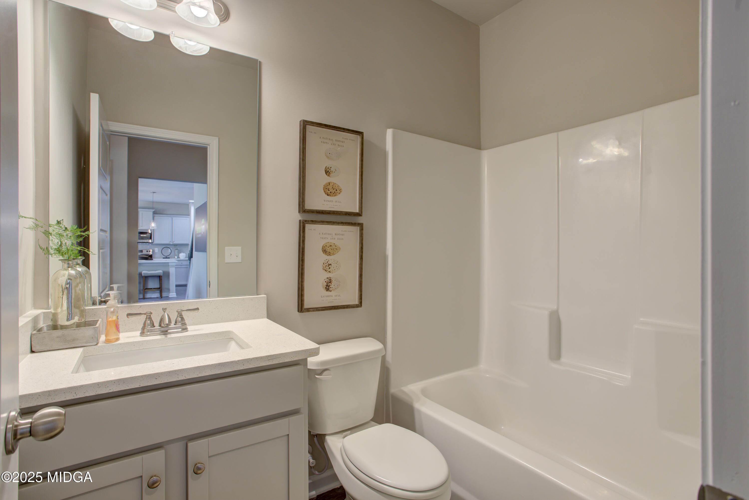 128 Bramblewood Lane Perry, GA 31069 - Photo 16 of 52 a bathroom with a sink a toilet and shower