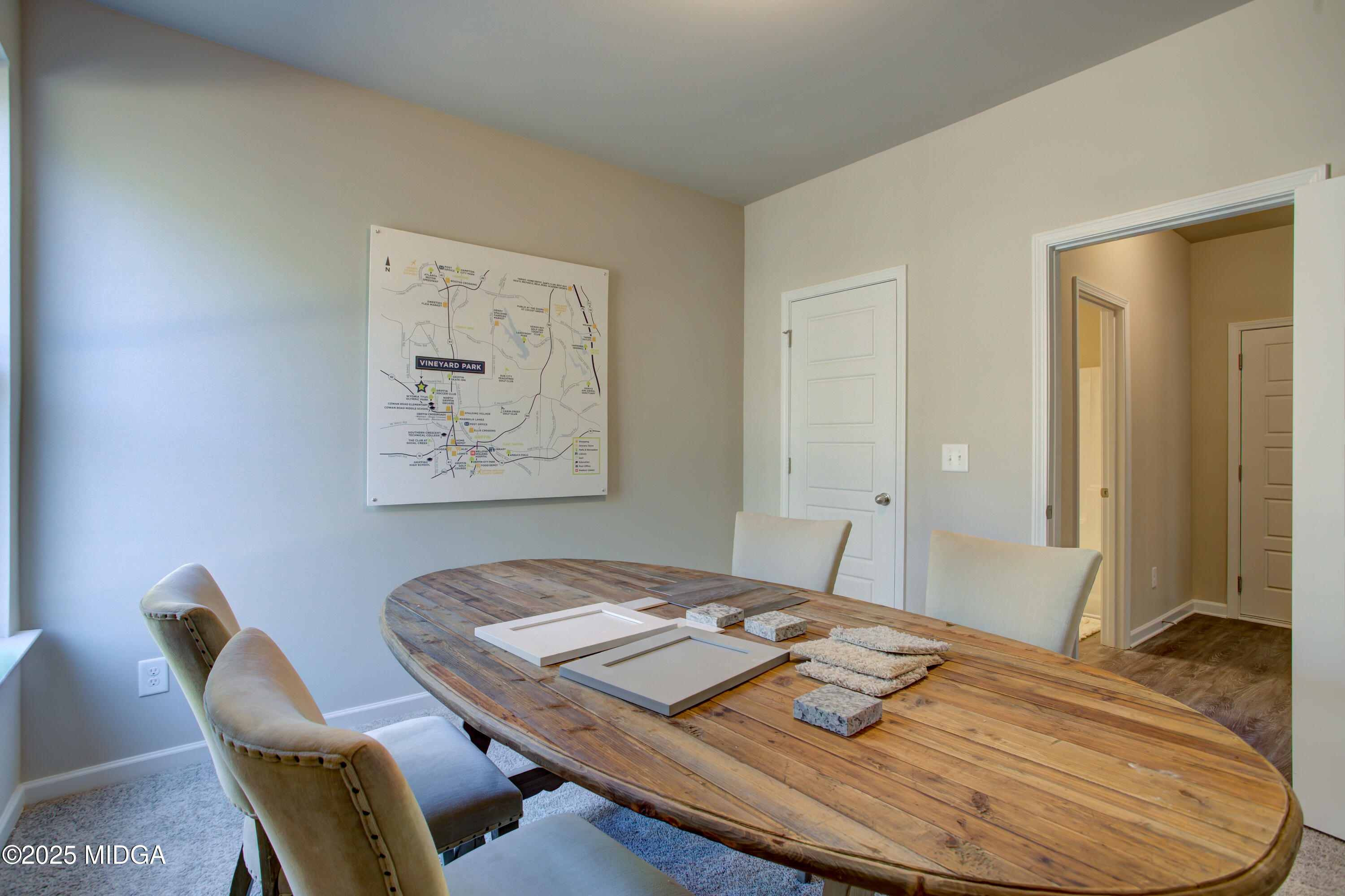 128 Bramblewood Lane Perry, GA 31069 - Photo 18 of 52 a view of a dining room with a table and chairs