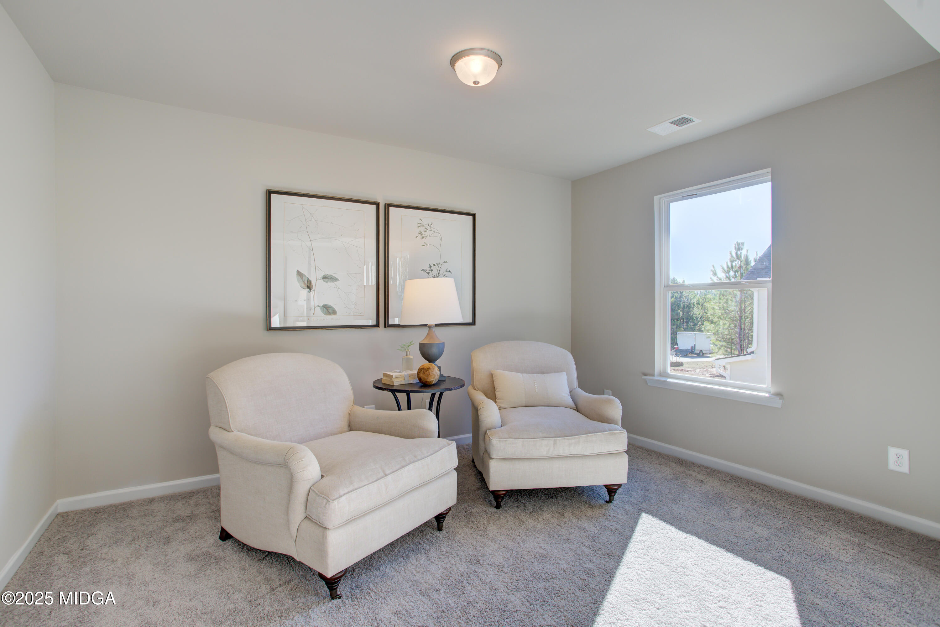 128 Bramblewood Lane Perry, GA 31069 - Photo 26 of 52 a living room with furniture and window
