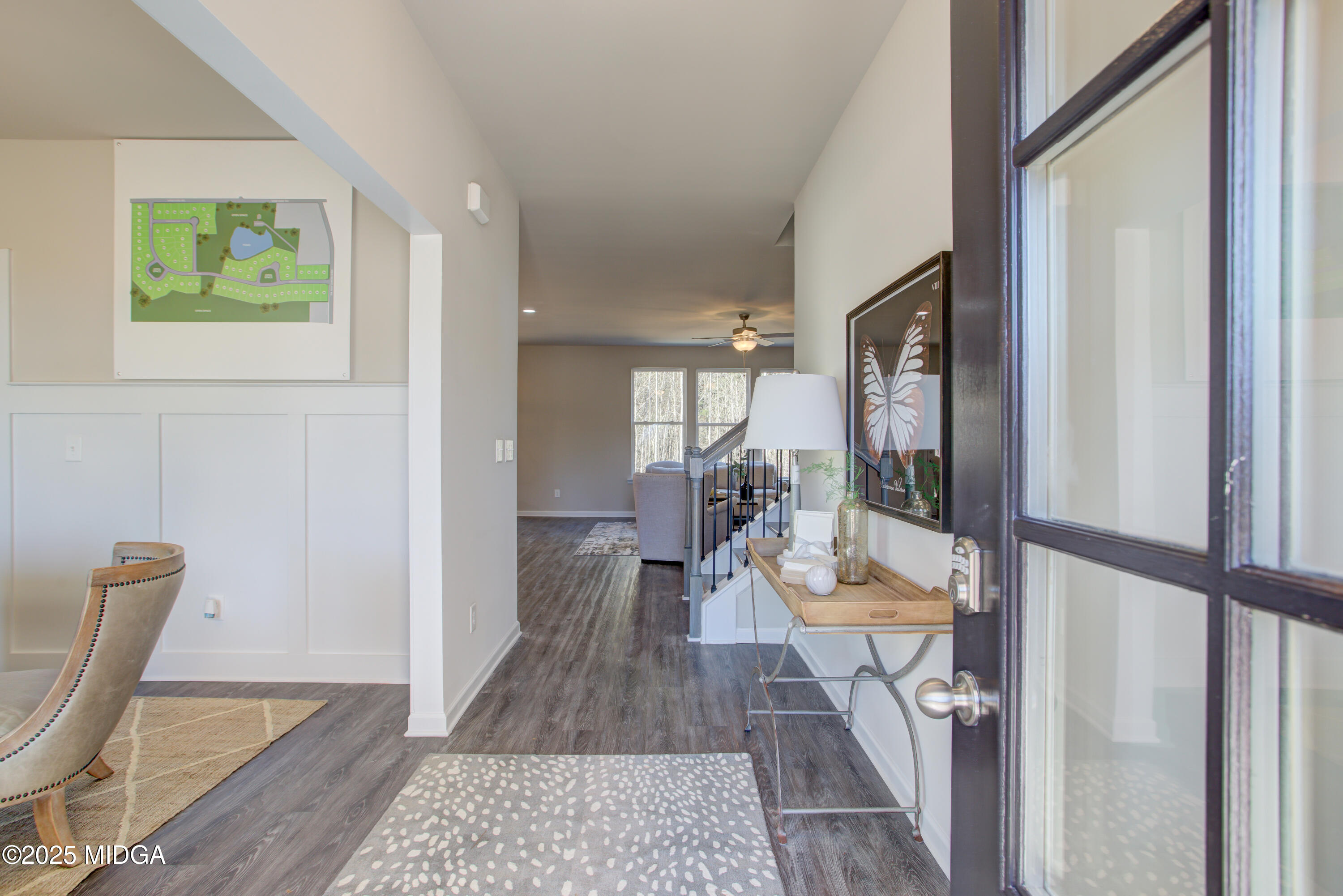 128 Bramblewood Lane Perry, GA 31069 - Photo 6 of 52 a living room with furniture and a wooden floor