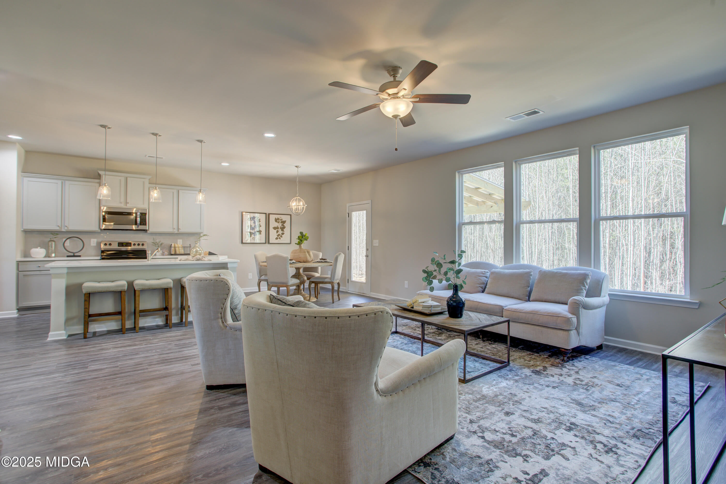 128 Bramblewood Lane Perry, GA 31069 - Photo 7 of 52 a living room with furniture and kitchen view