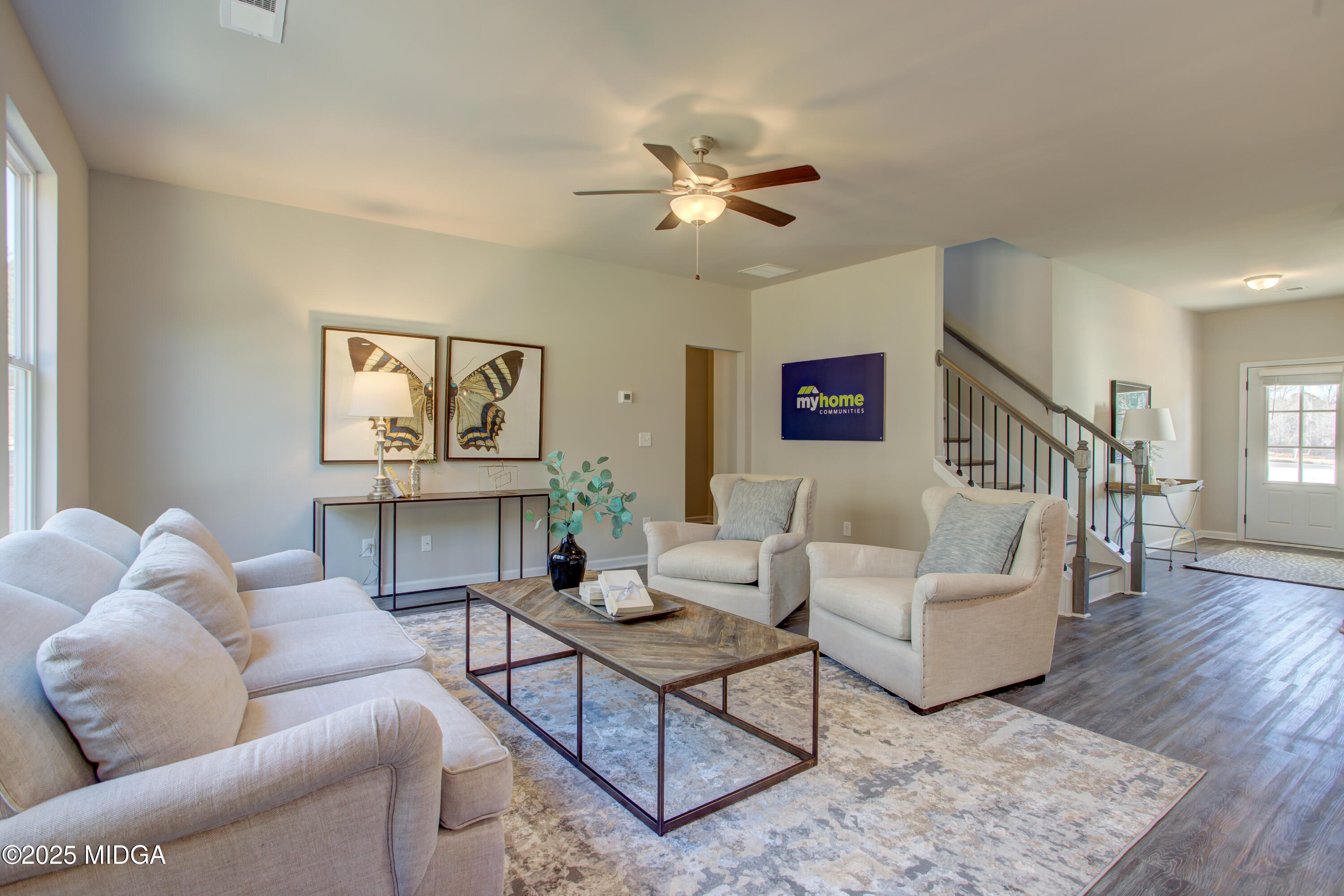 128 Bramblewood Lane Perry, GA 31069 - Photo 9 of 52 a living room with furniture and a wooden floor
