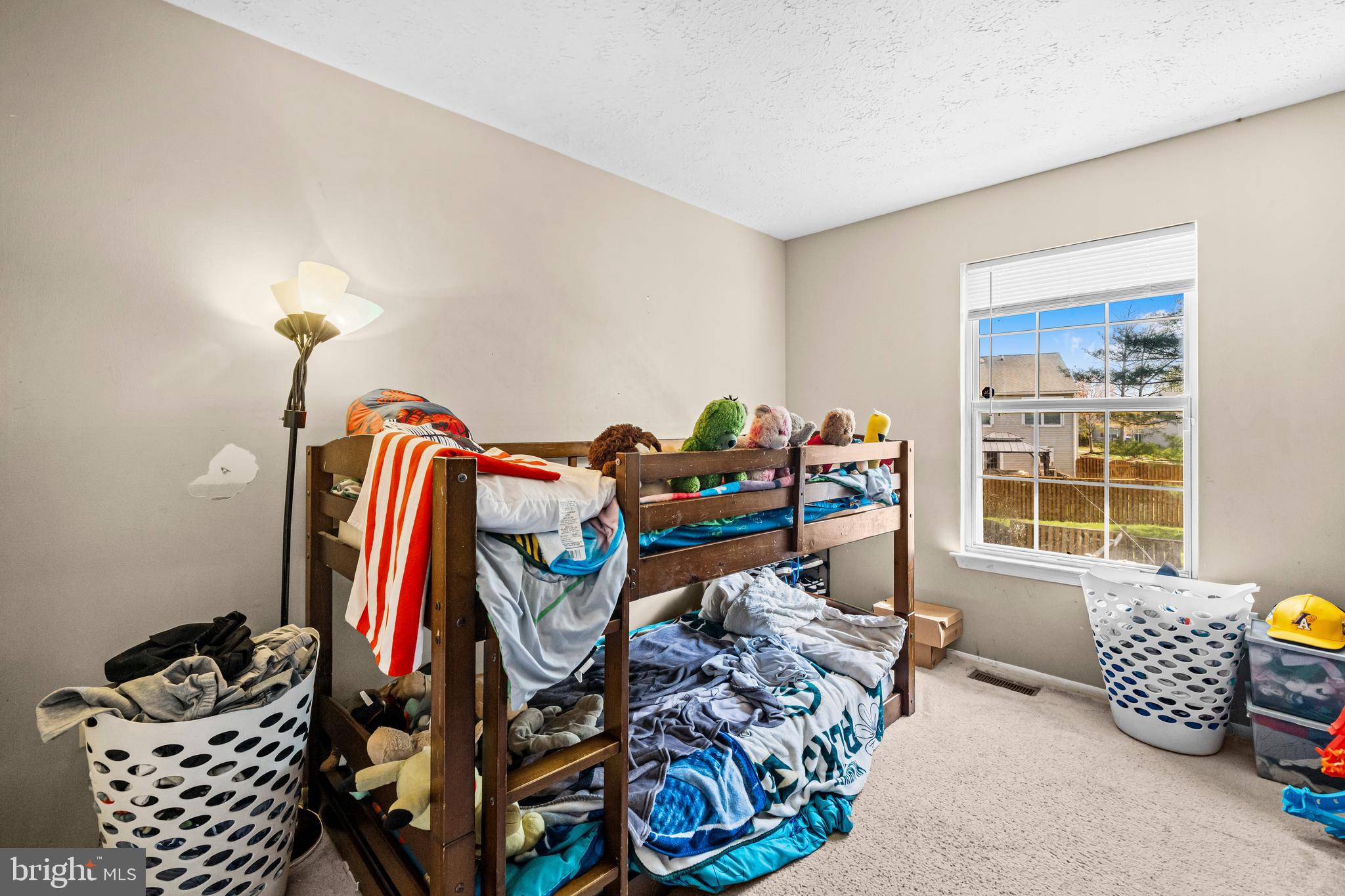 5818 Springfish Place Waldorf, MD 20603 - Photo 20 of 31 a bedroom with furniture and a window