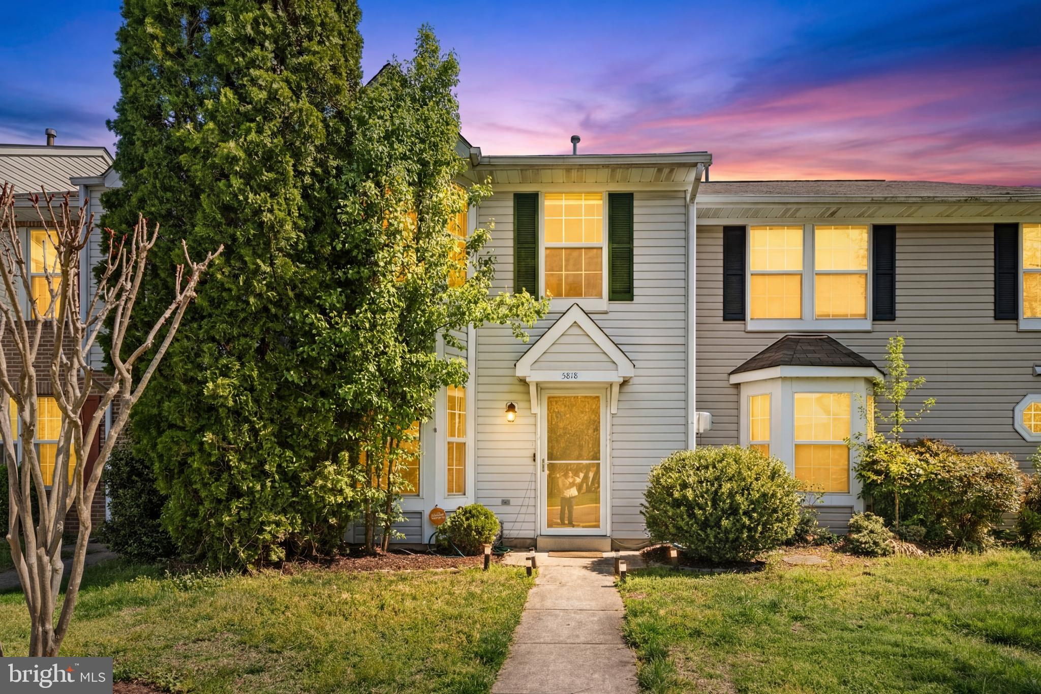 5818 Springfish Place Waldorf, MD 20603 - Photo 2 of 31 a front view of a house with a yard
