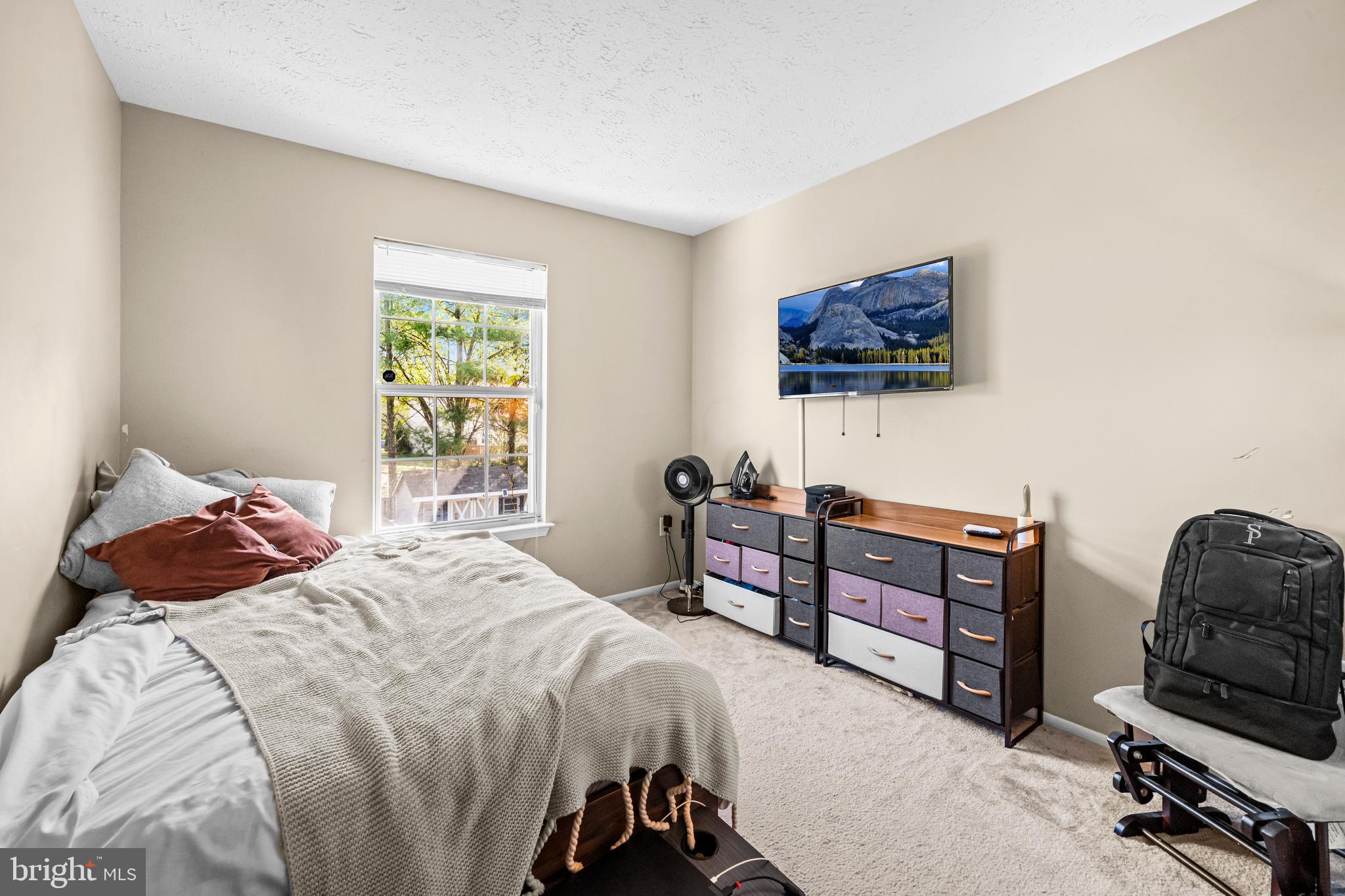 5818 Springfish Place Waldorf, MD 20603 - Photo 24 of 31 a bedroom with a bed and a workspace