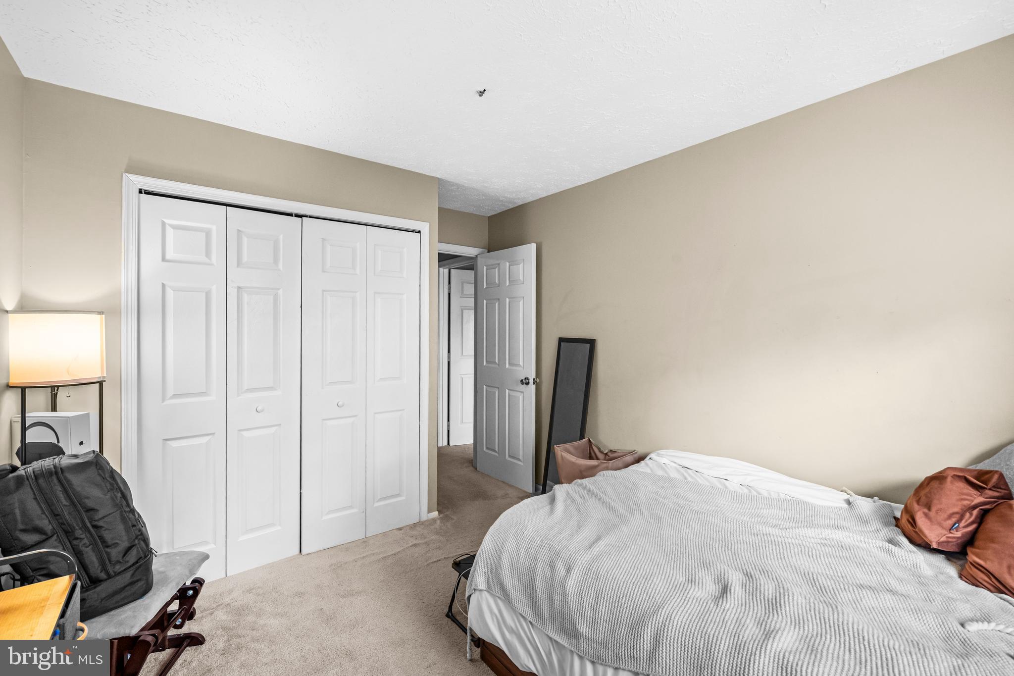 5818 Springfish Place Waldorf, MD 20603 - Photo 25 of 31 a bedroom with a bed and a closet