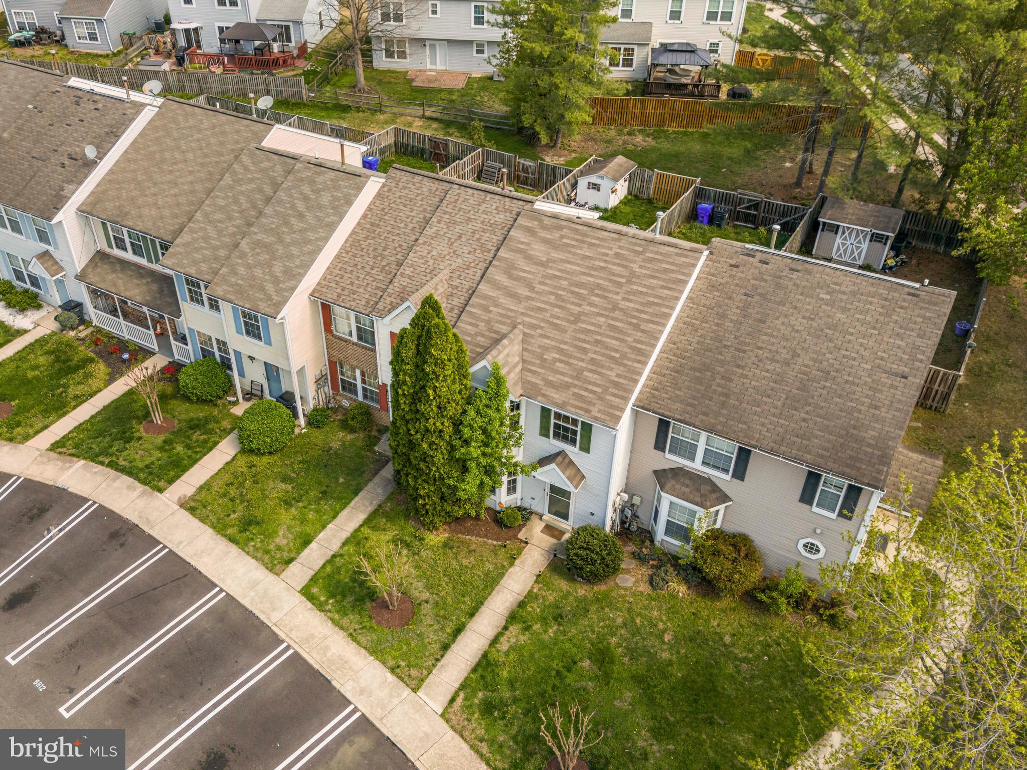 5818 Springfish Place Waldorf, MD 20603 - Photo 29 of 31 an aerial view of a house with a yard table and chairs