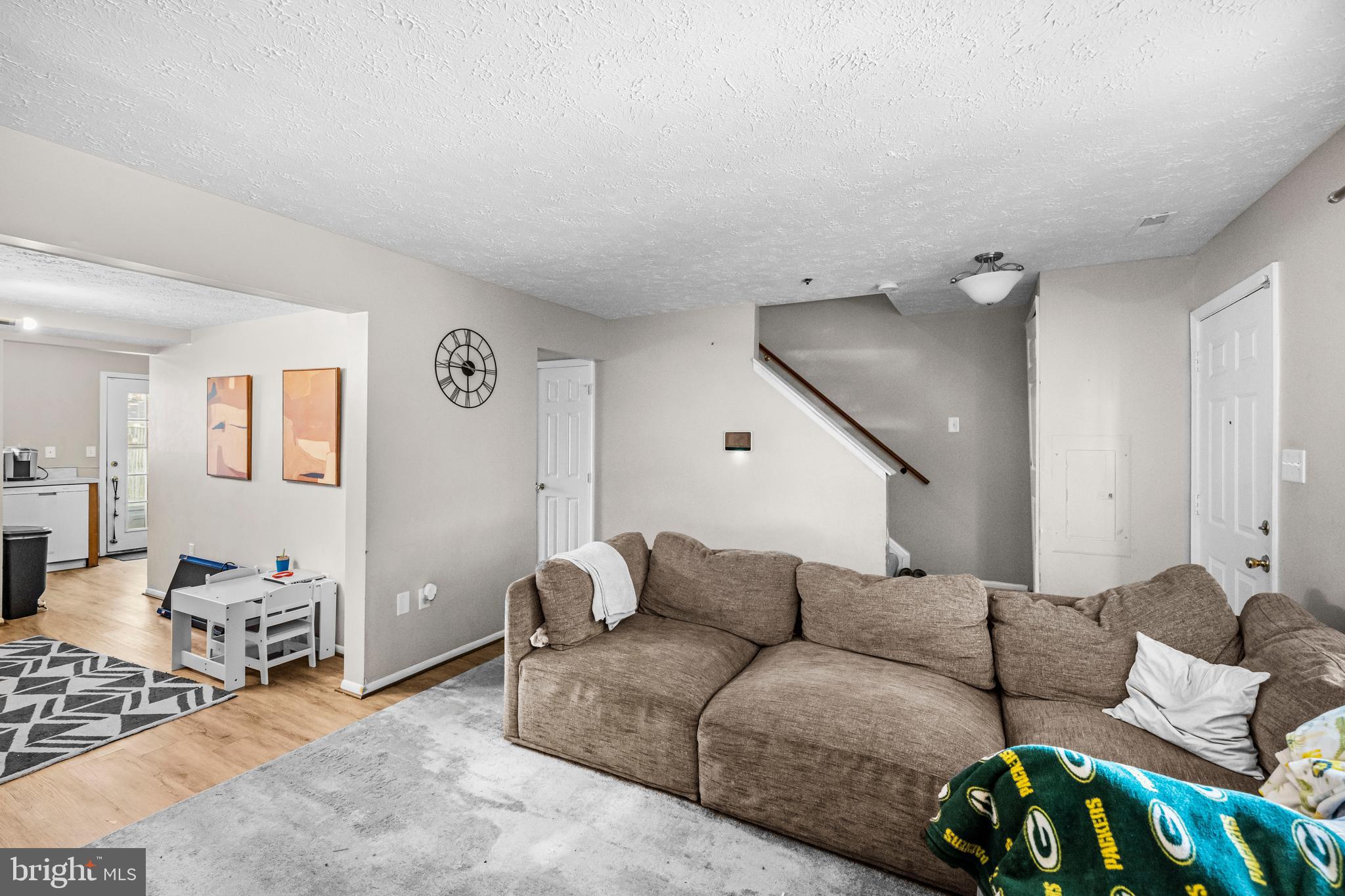 5818 Springfish Place Waldorf, MD 20603 - Photo 6 of 31 a living room with furniture and wooden floor