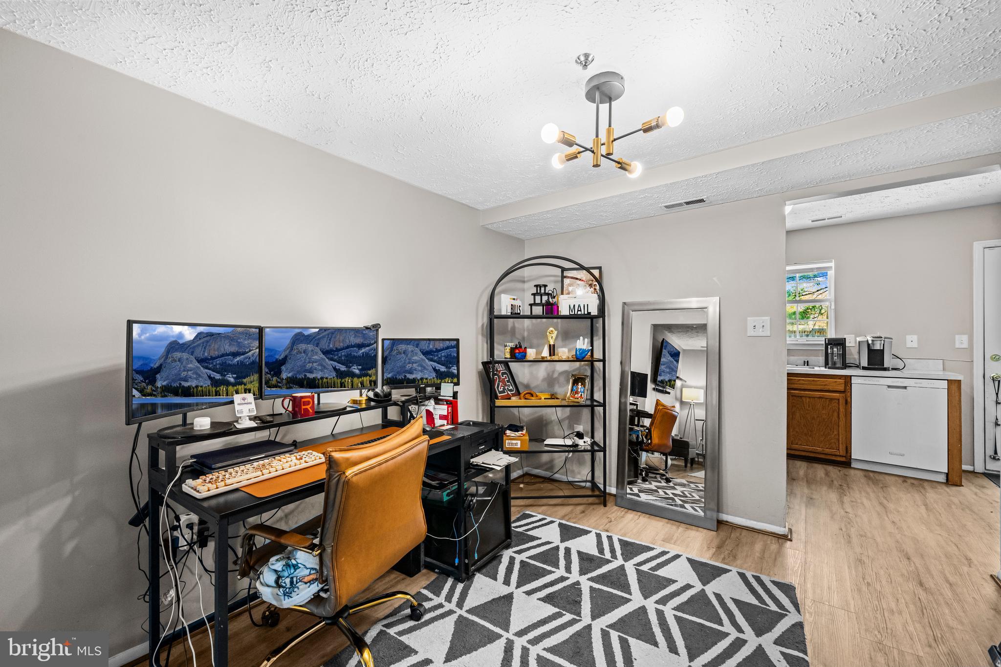 5818 Springfish Place Waldorf, MD 20603 - Photo 8 of 31 a view of a workspace with furniture and wooden floor