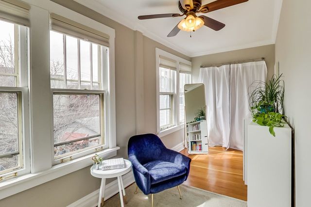 5626 North Ridge Avenue Chicago, IL 60660 - Photo 15 of 27 a living room with furniture and a large window