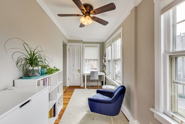 5626 North Ridge Avenue Chicago, IL 60660 - Photo 16 of 27 a living room with furniture and a large window