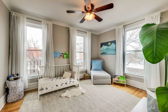 5626 North Ridge Avenue Chicago, IL 60660 - Photo 20 of 27 a living room with furniture and a window