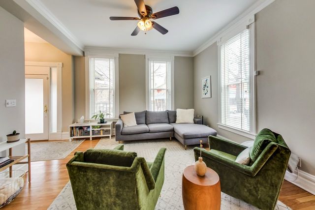 5626 North Ridge Avenue Chicago, IL 60660 - Photo 6 of 27 a living room with furniture and a large window