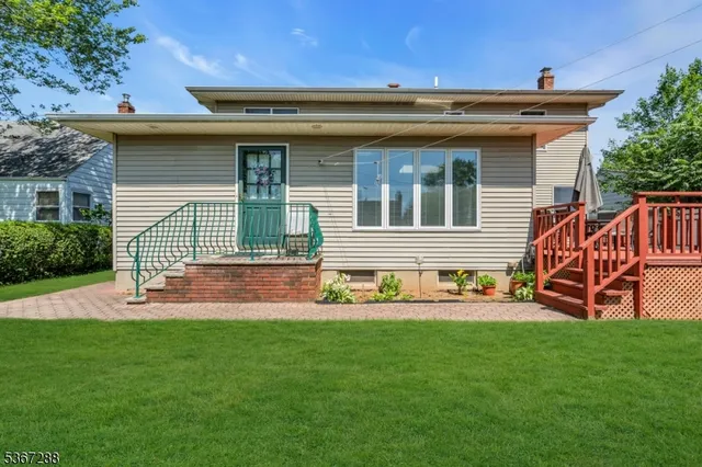 a house view with a garden space