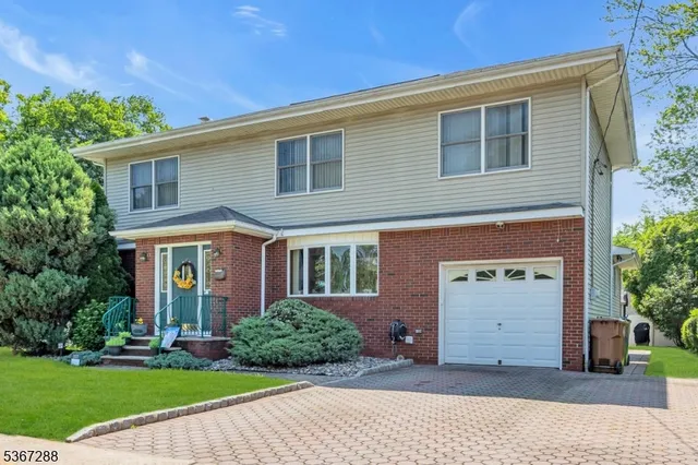 front view of a house and a yard