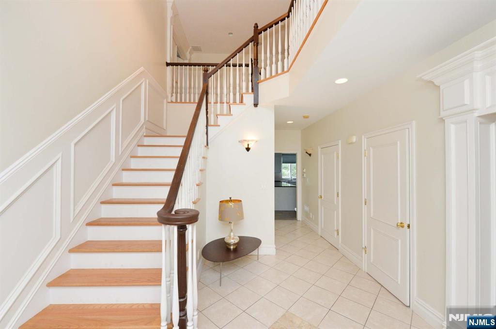 2186 Jones Road Fort Lee, NJ 07024 - Photo 13 of 27 a view of entryway and hall with wooden floor