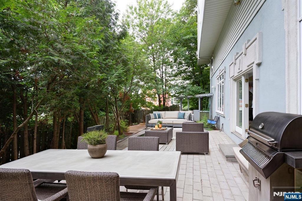 2186 Jones Road Fort Lee, NJ 07024 - Photo 27 of 27 a view of a patio with a table and chairs