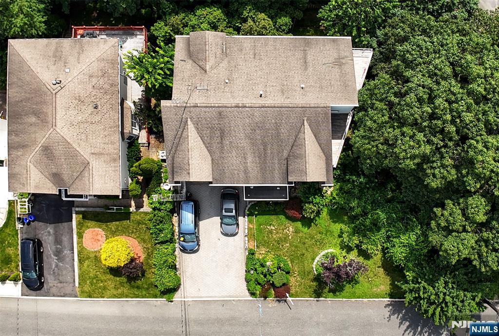 2186 Jones Road Fort Lee, NJ 07024 - Photo 4 of 27 an aerial view of a house with a garden