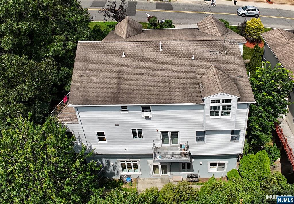 2186 Jones Road Fort Lee, NJ 07024 - Photo 5 of 27 a aerial view of a house with a yard
