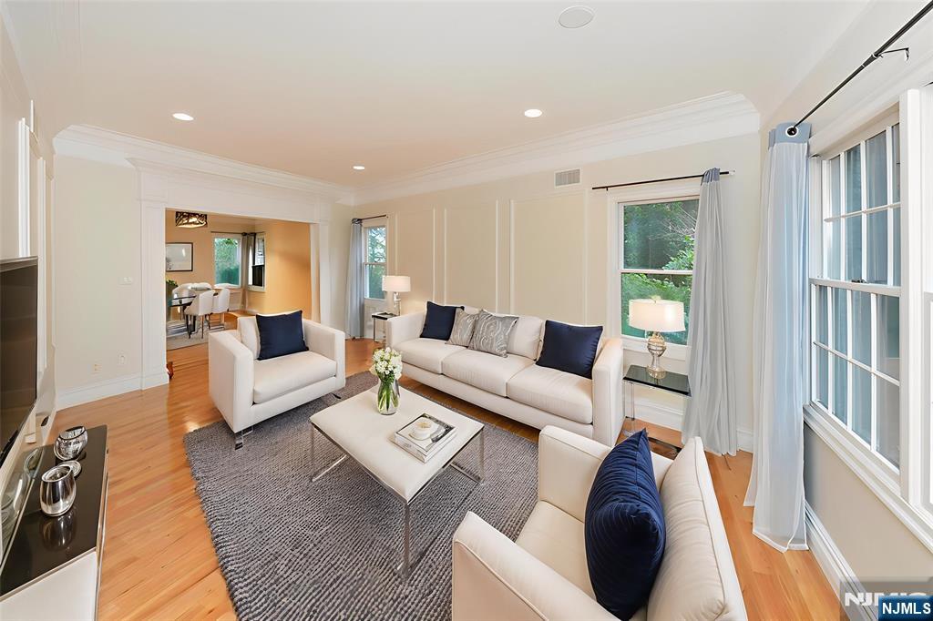 2186 Jones Road Fort Lee, NJ 07024 - Photo 10 of 27 a living room with furniture and a table