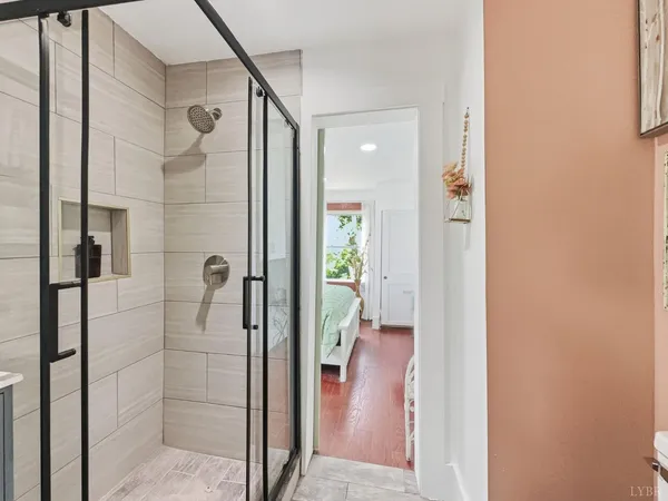 a view of a bathroom from a hallway