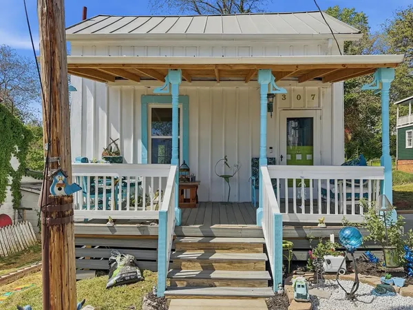a view of porch with a bench