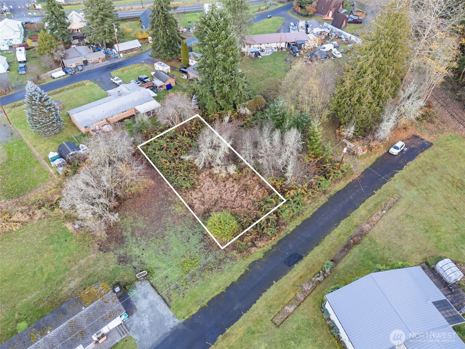 a view of a yard with an outdoor space
