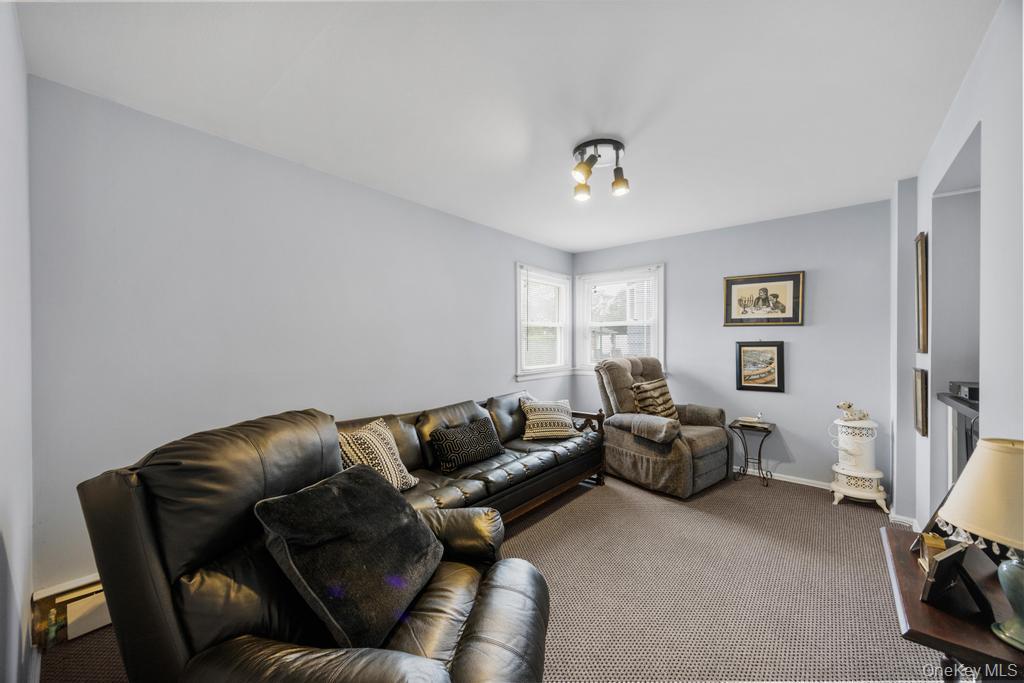 797 Caldwell Avenue Valley Stream, NY 11581 - Photo 22 of 45 Living area with carpet, baseboards, and baseboard heating
