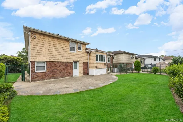 a house view with a garden space