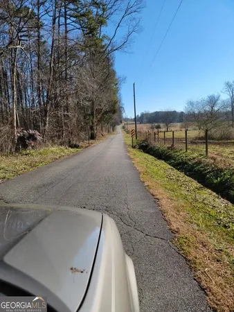 a view of a lake with a yard