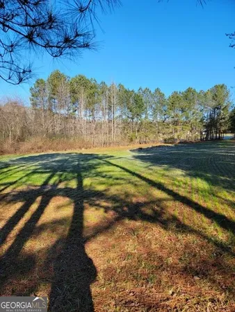 a view of an outdoor space and a lake view