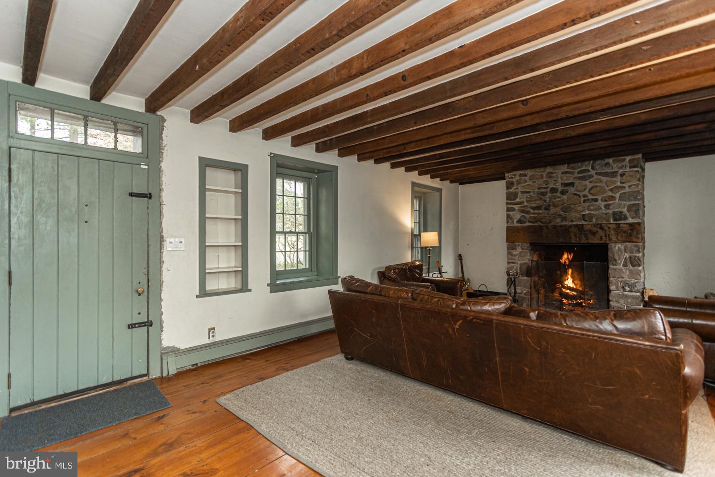 2 Woodhill Road Newtown, PA 18940 - Photo 4 of 58 a living room with furniture and a fireplace