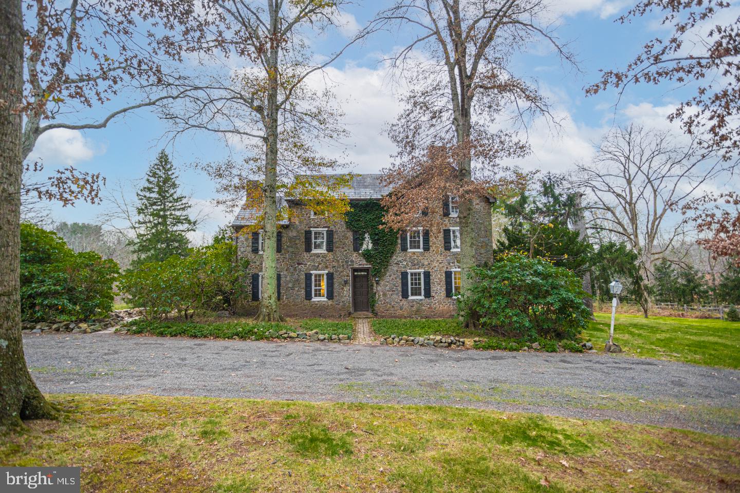 2 Woodhill Road Newtown, PA 18940 - Photo 49 of 58 a front view of a house with a yard and trees