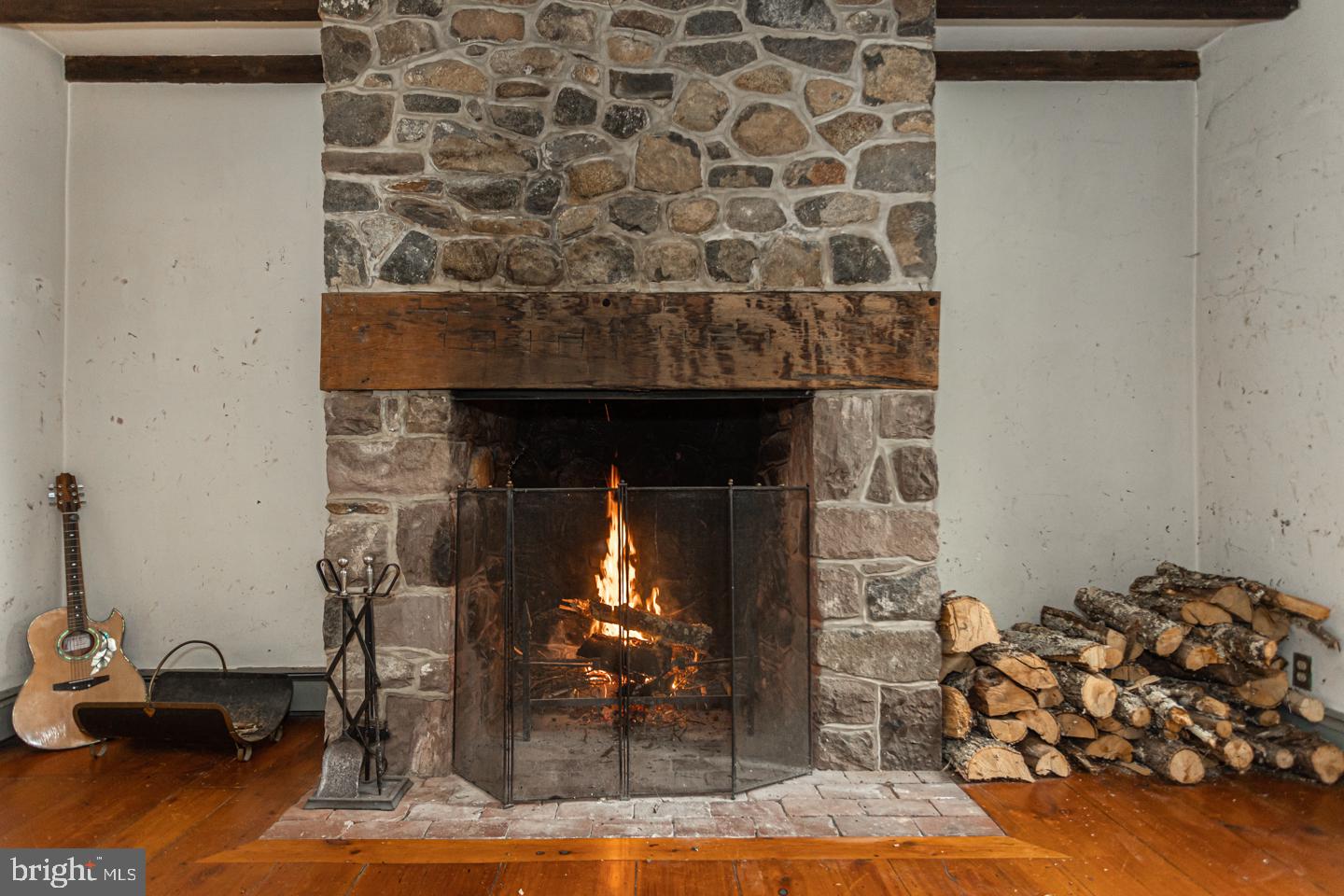 2 Woodhill Road Newtown, PA 18940 - Photo 6 of 58 a room with a fireplace and a mirror