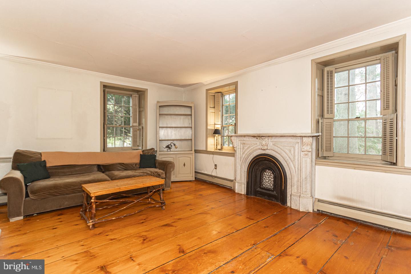 2 Woodhill Road Newtown, PA 18940 - Photo 8 of 58 a living room with furniture and a fireplace