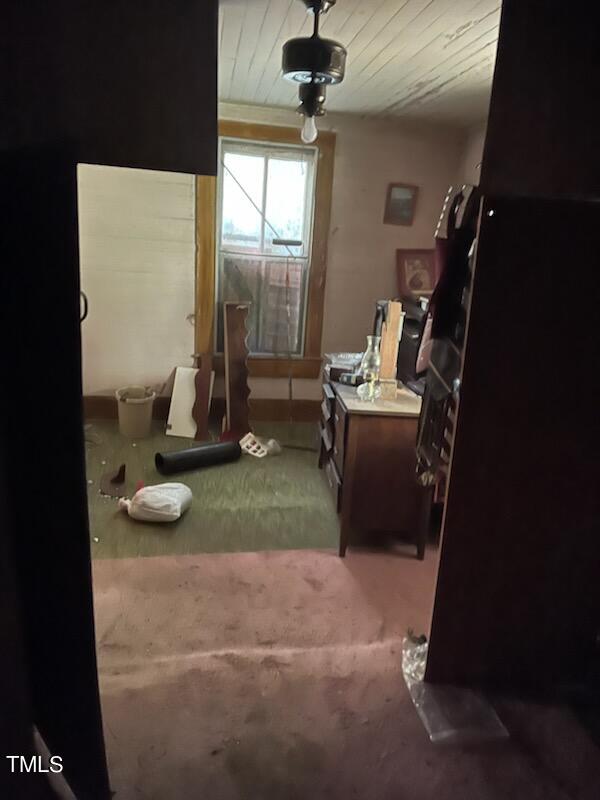 1954 Clark Road Lillington, NC 27546 - Photo 5 of 6 a living room with furniture and a floor to ceiling window