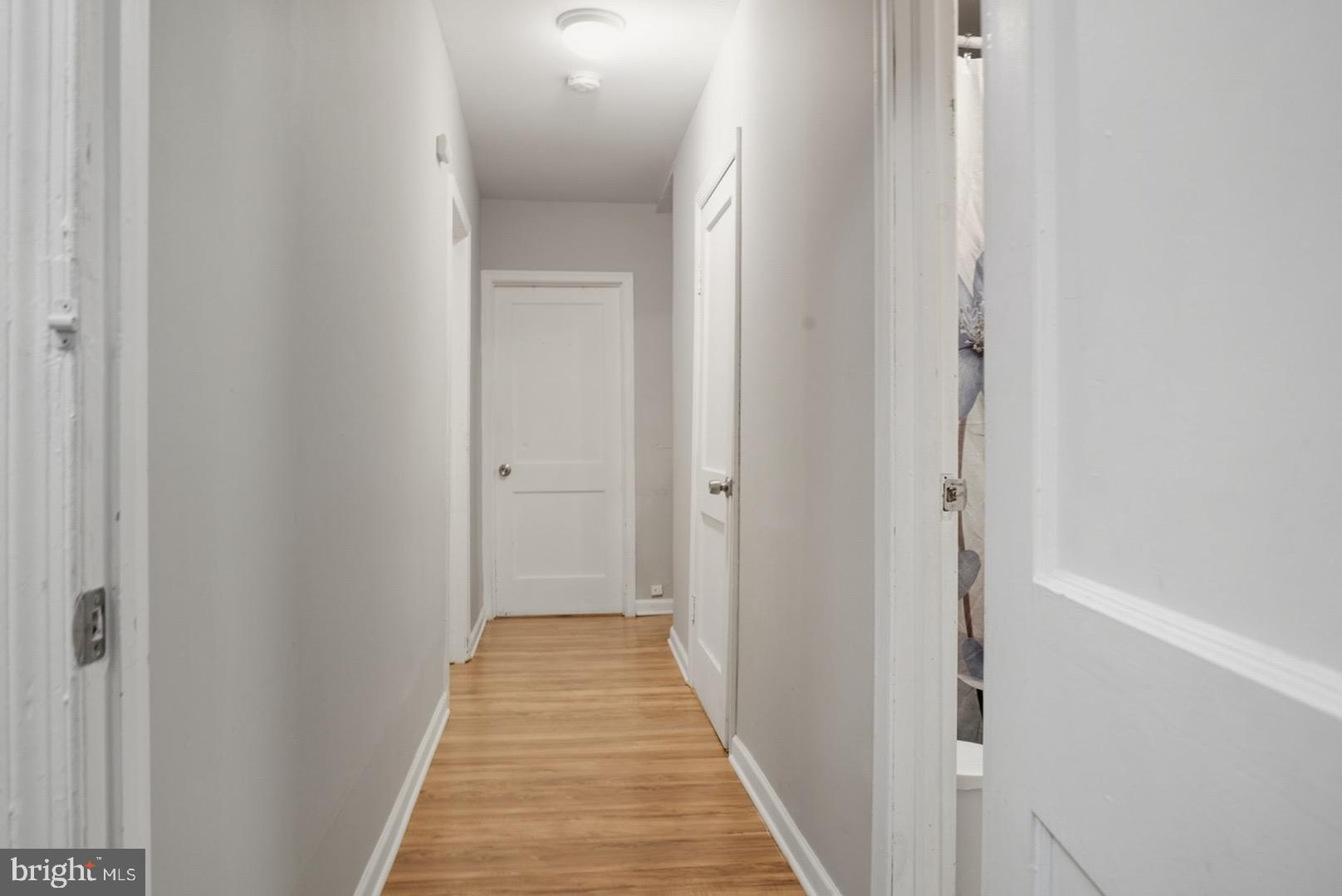 859 Cattell Road Wenonah, NJ 08090 - Photo 10 of 24 a view of a hallway with wooden floor