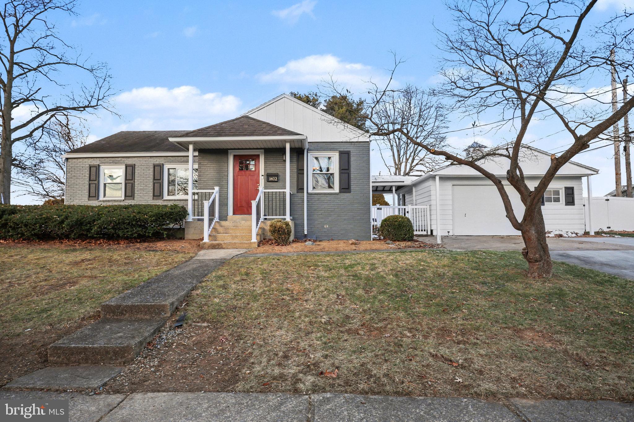 1402 Warwick Road Camp Hill, PA 17011 - Photo 1 of 36 a front view of a house with garden